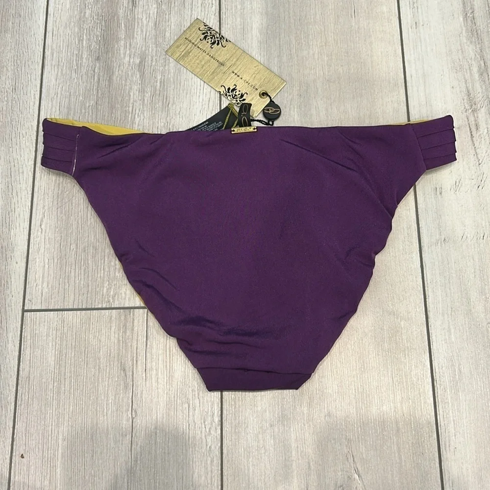 A. Che reversible swim bikini bottom Purple yellow size small